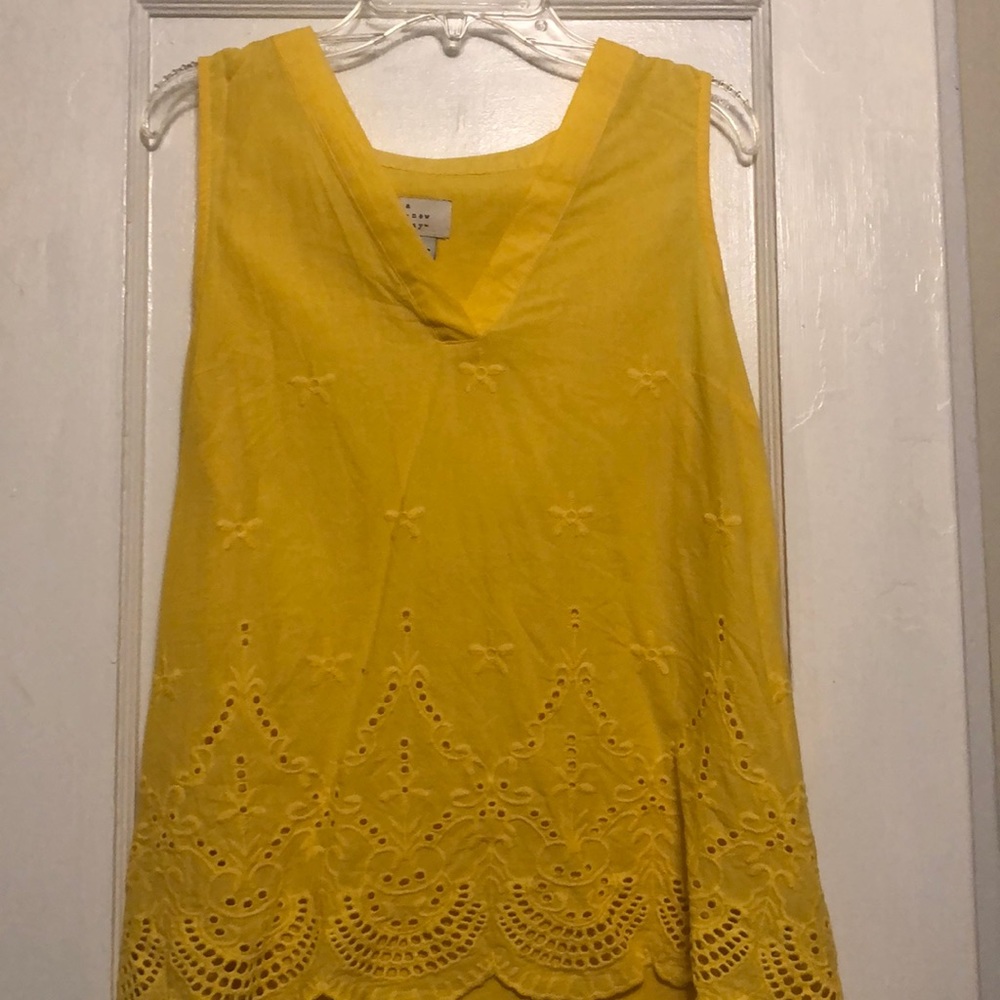 Yellow tank with crochet detail